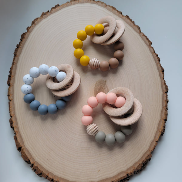 Teething rings with wooden accents